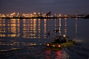 Dutton amphibeous car at Calais on English Channel at night